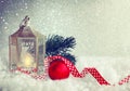 christmas, new year background, old lamp, spruce branch, red ball Royalty Free Stock Photo