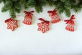 Christmas New Year holiday background, red gingerbread cookies on white table. Copy space. Royalty Free Stock Photo
