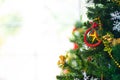 Christmas and New Year holiday concept. Closeup and blur Christmas tree decoration with ribbons balls and ornaments