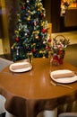 Christmas And New Year Holiday romantic Table Setting. Celebration. Place setting for Christmas Dinner. Holiday