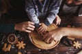 Mother, father and son kneading gingerbread dough Royalty Free Stock Photo