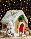 Christmas, new year house shape cake with bokeh