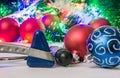 Christmas and New Year in neurology, medicine or neuroscience photo - two neurological hammer are located near balls for Christmas