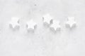 Christmas, New Year or Noel holiday festive decorations, stars on white background, flat lay composition, top view Royalty Free Stock Photo