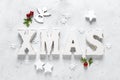 Christmas, New Year or Noel holiday festive winter greeting card with decorations, X-mas ornaments, stars, snowflakes, santa hat Royalty Free Stock Photo