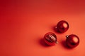 Christmas and New Year red balls with copy space on red backdrop Royalty Free Stock Photo