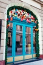 Christmas New year restaurant decoration on Lviv city street. Holiday season. Doors with gifts and presents Royalty Free Stock Photo