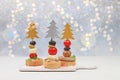 Christmas and New Year\'s dishes, a set of snacks for the festive table. Canapes of tomatoes, pate, mozzarella cheese,