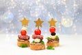 Christmas and New Year\'s dishes, a set of snacks for the festive table. Canapes of tomatoes, pate, mozzarella cheese,