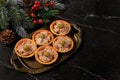 Christmas and New Year\'s dishes, a set of snacks and refreshing drinks for the holiday table. Plate with tartlets of pate,