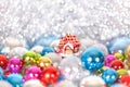 Christmas and New Year`s toy fairy tale red house in snowdrifts and snow of Christmas balls and tinsel in blue and white colors Royalty Free Stock Photo