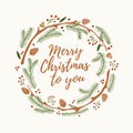 Christmas and New year`s wreath out of branches of spruce, bumps and red berries with words merry Christmas to you on light backgr