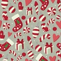 Christmas and New year seamless pattern with winter holidays symbols: mittens, sweets, gifts etc. Royalty Free Stock Photo