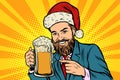 Christmas and New year. Smiling man with a mug of beer foam