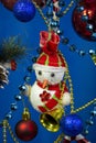 Christmas new year snowman snowman close-up on blue background Royalty Free Stock Photo