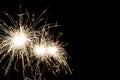 Three New Year sparkler burning isolated on a black background Royalty Free Stock Photo