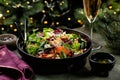 Christmas or New Year table with food. Winter salad with beetroot, oranges