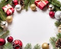 Christmas and New Year white background with empty space for text framed fir branches, boxes gifts and Christmas tree balls. Royalty Free Stock Photo