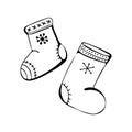 Christmas and new year winter icons. Boots, winter shoes. Hand drawn monochrome set, black and white set. holiday, celebration.