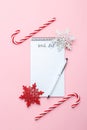 Christmas or new year wish list and pen Royalty Free Stock Photo