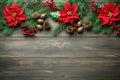 Christmas New Years banner frame from red poinsettia flowers green fir tree branches holly berry twigs pine cones on dark wood Royalty Free Stock Photo