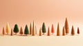 Christmas New Years banner row of wooden and artificial mini Christmas trees on pink background. Minimalist decoration of home Royalty Free Stock Photo