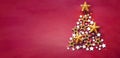 Christmas and New Years red background with Christmas Tree made of golden and wooden stars Royalty Free Stock Photo