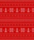 Christmas nordic pattern in red and white. Embroidery cross stitch Scandinavian motif ornament border with snowflakes.