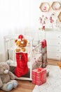 Christmas nursery, Christmas decor in children`s bedroom, children`s playroom decorated for new year, white children`s bedroom, Ch Royalty Free Stock Photo