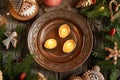 Christmas nut candles floating in a bowl of water, top view Royalty Free Stock Photo