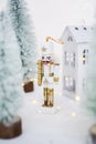 Christmas nutcracker toy soldier figurine ornament in white. Decoration for new year.