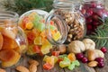 Christmas nuts and dried fruit mix in jars assortment of delicacies Royalty Free Stock Photo
