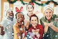 Christmas, office and business people blowing confetti and having fun together. Portrait, xmas party or group of happy Royalty Free Stock Photo