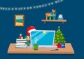 Christmas office workplace. Table with computer, gifts, christmas tree, books . Royalty Free Stock Photo