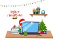 Christmas office workplace. Table with computer, gifts, christmas tree, books . Royalty Free Stock Photo