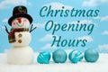 Christmas Opening Hours message with snowman, ornaments, and snow with sky