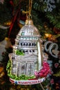 Christmas ornament of Capitol building in Washington DC hanging on old fashioned Christmas tree Royalty Free Stock Photo