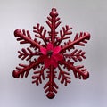 Christmas ornament hanging red ice star with glitter Royalty Free Stock Photo