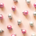 Christmas ornament. Pink and silver baubles on pink background Royalty Free Stock Photo