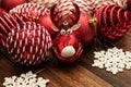 Christmas ornament reindeer surrounded by red decorations Royalty Free Stock Photo