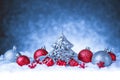 Christmas ornament in snow on glitter background Royalty Free Stock Photo