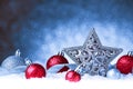 Christmas ornament in snow on glitter background Royalty Free Stock Photo