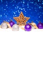 Christmas ornament in snow on glitter background Royalty Free Stock Photo