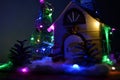 Christmas ornamental house with garland