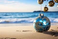 Christmas ornaments ball. Christmas environment on the beach by the sea. New Year\'s holiday