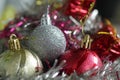 Christmas ornaments decoration with white, golden and red Christmas balls closeup. Royalty Free Stock Photo