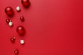 Christmas ornaments decorations background. Simple, modern, classic red and white glass baubles balls horizontal border. Royalty Free Stock Photo