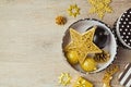 Christmas ornaments and decorations in box over wooden background. View from above Royalty Free Stock Photo