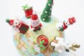 Christmas Ornaments on Globe Royalty Free Stock Photo