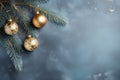 Christmas ornaments gold baubles and fir branch on gray backdrop, top view, Christmas background. Generative AI Royalty Free Stock Photo